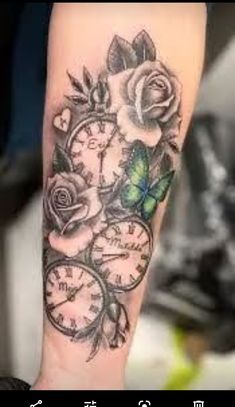 a clock and roses tattoo on the arm