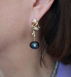 Photo by AURUM in Aurum Jewelers. Image may contain: one or more people and closeup. Luxury Gold Pearl Earrings With Natural Stones, Fine Jewelry Pearl Earrings With Pear-shaped Gemstone, Luxury Gold Gemstone Pearl Earrings, Luxury Gold-tone Pearl Jewelry, Luxury Gold-tone Pearl Drop Earrings