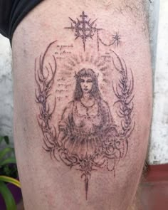 a man with a tattoo on his thigh