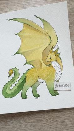 a watercolor drawing of a yellow and green dragon