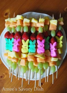 an image of some fruit kabobs on a plate