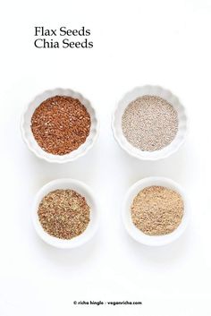 four bowls filled with different types of seeds on top of a white surface, and the words flax seeds chia seeds above them