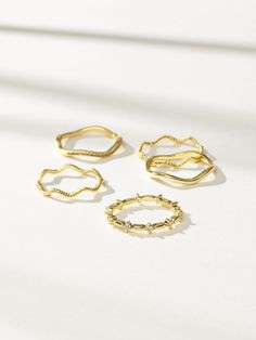 Our Vintage 5 Layered Ring Set has all the simple rings you need. Wear them all together or mix and match for a more personalized look. Featuring four different wave rings and a studded ring, there’s something for every style. Wave Rings, Uncommon James, Simple Rings, Stackable Ring Sets, Layered Rings, Gold Rings Stackable, Wave Ring, Gold Ring Sets, Size 8 Women