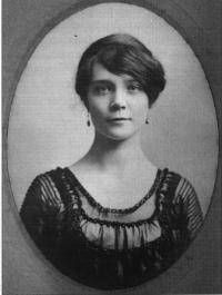 an old black and white photo of a woman