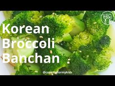 broccoli and other vegetables on a plate with the words korean broccoli banchan