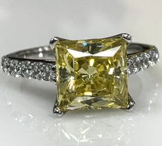 Canary Yellow Princess  Cut With Round by InfinityJewelersUSA Yellow Diamond Ring With Pave Setting For Wedding, Yellow Diamond Promise Ring With Vvs Clarity, Yellow Cubic Zirconia Rings With Brilliant Cut, Yellow Cubic Zirconia Rings With Diamond Accents, Emerald Cut Cubic Zirconia Ring With Pave Setting, Yellow Diamond Ring With Pave Setting For Anniversary, Yellow Cubic Zirconia Ring For Anniversary, Princess Cut Brilliant Cubic Zirconia Rings, Princess Cut Cubic Zirconia Ring With Center Stone