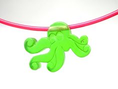 90's octopus necklace neon colors pink green retro resin underwater necklace handmade The pictured necklace is handmade in our Cologne studio. The pendant is made of synthetic resin and the chain of flexible plastic. Color: green pink Pendant size: approx. 3 x 2.4 cm Brand: SoHo®   Length: about 40 - 42 cm Green Fun Plastic Jewelry, Fun Green Plastic Jewelry, Playful Green Plastic Jewelry, Fun Green Necklaces For Gifts, Fun Green Necklaces For Gift, Fun Green Necklace For Gift, Playful Bright Colored Jewelry Gift, Octopus Necklace, Pink Pendant