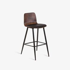 an upholstered bar stool with black legs and a brown leather seat, viewed from the front