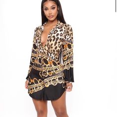 Large Fashion Nova Chain Print Dress Chic Gold Dress With Chain Strap, Chic Leopard Print Mini Dress For Date Night, Chic Mini Dress With Chain Strap, Elegant Leopard Print V-neck Mini Dress, Chic Dresses With Chain Strap For Date Night, Elegant Brown Mini Dress For Going Out, Chic Mini Dress With Chain Strap For Date Night, Elegant Brown Mini Dress For A Day Out, Spring Chic Chain Print Dress