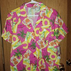 Vintage Erika Hawaiian Camp Shirt In Hot Pink, With Hibiscus Flowers In Yellow And White And Palm Leaves And Green. This Size Small, Hot Pink Buttons, Collared Shirt With Lapels, Vented Hem, Will Be An Attention Grabber Wherever Worn.***Vintage Size Small, Please Check Measurements***. Care: Machine Washable With Like Colors, Tumble Dry Low, Steam Iron As Needed On Medium Condition: Nwt, 10:10. Fabric: 55% Cotton, 45% Rayon. Measurements: Shoulder To Hem: 26 In Shoulder To Top Of V Neck: 7 In Pi Pink Button-up Beach Shirt, Pink Short Sleeve Hawaiian Shirt With Floral Print, Pink Hawaiian Shirt For Summer, Pink Camp Collar Casual Shirt, Pink Collared Beach Top, Pink Floral Print Short-sleeved Hawaiian Shirt, Collared Pink Beach Tops, Fun Summer Button-up Shirt, Pink Casual Shirt With Camp Collar