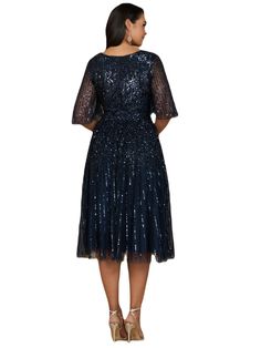 Beaded v-neckline midi dress. This dress features a long flowing A-line silhouette giving an elegant sequined Midi look. It is a great dress for a fun and easy night out, or a wedding guest! It's great for someone looking for a modest and fun look Back zipper Beaded tulle on stretch jersey lining Professionally clean Imported Short sleeves Midi dress Fits true to size, we recommend ordering your normal size. Fitted body with flowing skirt V-neck Sequin Dress For Gala, Elegant A-line Sequin Dress For Evening, Glamorous A-line Sequin Evening Dress, Glamorous Embellished V-neck Midi Dress, V-neck Evening Dress With Contrast Sequins, Evening V-neck Dress With Contrast Sequins, V-neck Mother Of The Bride Dress For Gala Evening, Midi Length Gala Dress With Contrast Sequin, Midi Length Dress With Contrast Sequin For Gala