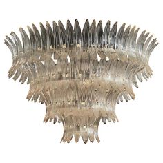 a glass chandelier hanging from the ceiling on a white background with clippings