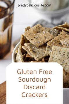 gluten free sourdough discard crackers in a white bowl with text overlay