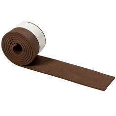 a roll of brown and white yoga mat