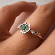 Title: Lily of the Valley May Birth Month Flower Ring with Emerald Birthstone Material: Material:  Solid 14k Yellow Gold, 14k White Gold, 14k Rose Gold or solid 925 Sterling Silver.  18k and 9k Gold are available upon request. Timeline: Custom made to order (2 weeks) Size:  Stone: 2 mm genuine AA grade brilliant cut and 1.2-3 solid round band Special Options: I offer different gemstones upon request  Story: It is also believed that Apollo created the groundcover flower for nymphs to walk on. It May Birth Month Flower, May Birth Flower, May Birth Flowers, Lily Of The Valley Flowers, Emerald Birthstone, Ring Emerald, Birth Flower, Birth Month, Birth Flowers