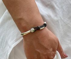 This wrap leather bracelet is handmade to order by me using real leather cord - 2mm, silver plated zamak clasp and silver plated beads.  📌HOW TO CHOOSE YOUR BRACELET SIZE: - Using a flexible measuring tape, measure the smallest part of your wrist (the wrist joint, where your arm connects to your hand) - Ensure that it is tight around your wrist  - Add 0.25 inches for comfort - This is your bracelet size  Bracelet sizes are very individual and different for everyone and it is important to make s Modern Adjustable Leather Bracelet With Sterling Silver Clasp, Adjustable Sterling Silver Leather Bracelet For Everyday, Adjustable Silver Leather Bracelet With Sterling Silver Clasp, Adjustable Silver Leather Bracelet With Lobster Clasp, Handmade Adjustable Minimalist Leather Bracelet, Minimalist Silver Adjustable Leather Bracelet, Adjustable Braided Bangle Bracelet With Sterling Silver Clasp, Adjustable Silver Leather Bracelet With Sliding Knot, Adjustable Silver Leather Bracelet Hand Wrapped