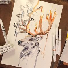 a drawing of a deer with antlers on it's head and flames coming out of its antlers