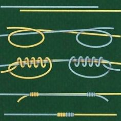 four different types of wires on a green surface with yellow and white wire attached to them