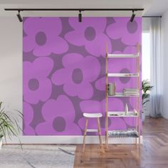 a purple flower wall mural in a living room