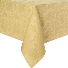 a table cloth with a gold floral design on the top and bottom, in front of a white background