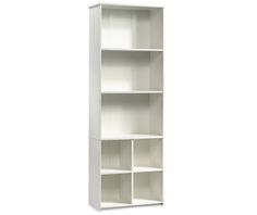 a white bookcase with four shelves on each side