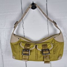 Lime Green Shoulder Bag from Un Après-midi de Chien. In very good condition however does show some signs of use see image 7. Size: Height: 17 cm Length: 41 cm Depth: 12 cm Handle: 38 cm Yellow Bags With Silver-tone Hardware For Everyday Use, Yellow Rectangular Bag With Silver-tone Hardware, Yellow Shoulder Bag With Branded Hardware, Lime Green, Purses And Handbags, Handbags, Shoulder Bag, Green, Purses And Bags