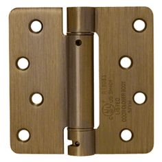 an antique brass plated door hinge with holes on the front and back side