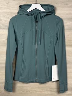 Lululemon Hooded Define Jacket Nulu Size 8 Tidewater Teal TIDT 56199 120522 Condition is New With Tags. Shipped with USPS. Will combine shipping on multiple purchases and refund any shipping overage. Lululemon Hooded Define Jacket, Hooded Define Jacket, Define Jacket, Christmas List, Active Wear, Size 10, Women Accessories, Tags, Clothes For Women