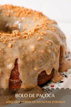 a bundt cake covered in icing on a plate