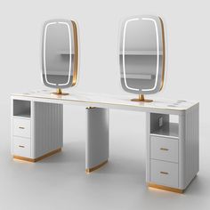 a white desk with two mirrors on it