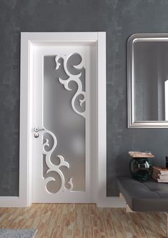 a white door with an intricate design on it