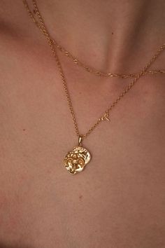 This stunning Taurus Zodiac Necklace is made from our everlasting 18K gold fill material. This ethically made piece features a double-sided pendant showcasing the bold bull on one side and its twinkling constellation on the other.  Waterproof? Check. Tarnish resistant? You bet. Safe for sensitive skin? Absolutely.  Don't miss out on this unique and meaningful piece. Whether you're treating yourself or searching for that perfect birthday gift for a loved one, this zodiac necklace is written in th Gold Zodiac Sign Amulet Necklace, Gold Zodiac Sign Pendant Necklaces, Gold Zodiac Pendant Necklace, Gold Zodiac Sign Celestial Necklace, Gold Zodiac Celestial Necklace, Gold Zodiac Sign Necklace, Gold Celestial Zodiac Necklace, Gold-plated Zodiac Sign Necklace, Gold Zodiac Sign Initial Pendant Jewelry