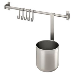 a pot and pan hanging on a metal rack