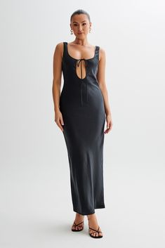 She's beauty, she's grace.The AUBRIE is an elegant satin maxi dress that features a scooped neckline on the front and the back, as well as a front keyhole with ties. A long slip dress with a relaxed fit, it’s cut from the softest satin to deliver an ethereal look for every event. Style it with the Fleur Thin Strap High Heels. Strap High Heels, Long Slip Dress, Long Slip, Scooped Neckline, Satin Maxi, Satin Maxi Dress, Dress Satin, Satin Slip Dress, Black Maxi Dress