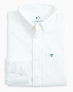 Young boys won’t mind dressing up in this ultra-comfort button down shirt. With moisture-wicking fabric, UV sun protection and lightweight 4-way stretch, this classic white button down is perfect for school, church, and any day in between. Classic Solid Shirt For School, White School Shirt With Button Closure, Preppy White Button-up Shirt, White Button-up Preppy Shirt, White Preppy Shirt With Button Closure, Preppy Boys Outfits, Preppy Boys, Southern Outfits, Classic White Shirt