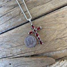 "Beautiful red garnet cross necklace...1 9/16\" tall with bail by 13/16\" wide at the widest spot, cast in sterling silver 925 with five 4mm by 6mm oval shape and two mm by 4mm round garnet stones...the chain is 18\" long also in sterling silver 925 with a lobster catch, all the garnet stones a well matched" Red Oval Sterling Silver Necklace, Red Cross Necklace In Sterling Silver, Red Sterling Silver Cross Necklace, Red Garnet Pendant Necklace, Red Garnet Oval Pendant Necklace, Antique Garnet Pendant Necklace, Sugar Skull Ring, Red Garnet Faceted Necklace, Rose Ring