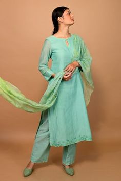 Sea green kurta featuring a keyhole neckline and three-quarter sleeves with floral applique work. Paired with matching pant and a floral print dupatta., Fit: Relaxed Applique Kurta, Kurta And Dupatta, Applique Work, Keyhole Neckline, Women Kurta, Embroidered Applique, Straight Kurta, Floral Applique, Sea Green