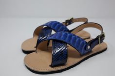 Custom Exotic Blue Snake Sandal  - Made from the special Oakleaf Tanned leather - This Sandle is handcrafted from real Snake  100% Real Snake skin  - Adjustable with Four holes settings - Size from 6-15 USA Men  -Insole /Natural leather  -Sole /Rubber  - Color /Honey  - Handmade and designed in USA, Orange County  Please check below for the correct size. If you wear a half size order up to the next full size. If you are unsure of your size, please contact me so I can assist you. EU=39UK=5USA=6 E Blue Beach Sandals With Leather Sole, Blue Sandals With Leather Sole For Beach, Blue Leather Sole Sandals For The Beach, Handmade Blue Sandals For Summer, Blue Open Toe Huarache Sandals For Beach, Blue Leather Open Toe Huarache Sandals, Handmade Blue Sandals For Vacation, Blue Leather Huarache Sandals For Summer, Orange Country