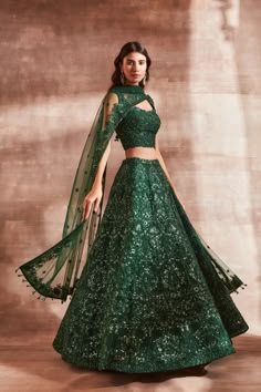 Emerald Green Outfits For The Cocktail That Are Absolute Stunners! | WedMeGood Deep Green Lehenga, Indian Wedding Outfits Green, Indian Green Dress, Emerald Green Wedding Lehenga, Green Sangeet Outfit, Emerald Green Indian Outfit, Emerald Green Lengha, Green Indian Wedding Dress, Emerald Lehenga