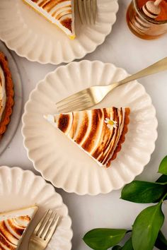 three plates with slices of pie on them