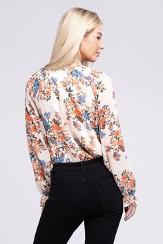 The delicate floral pattern and sheer chiffon fabric make this blouse a true work of art. Its elegant design and lightweight material create a feminine silhouette, making it perfect for any occasion. Floral print pattern Stand collar + V neckline Raglan long-sleeve Non-stretch Lined at bodice, not lined at sleeve Button up closure Fabric: 100% Polyester -Model is 5' 8" and wearing size Small Care instruction: Machine wash cold, tumble dry low Feminine Chiffon Blouse For Spring, Flowy Chiffon Blouse With Floral Print, Chic Chiffon Top With Floral Print, Casual Chiffon Blouse With Floral Print, Flowy Floral Print Blouse, Spring Printed Chiffon Blouse, Floral Print Chiffon V-neck Top, Feminine Floral Print Blouse For Work, Feminine Floral Print Workwear Blouse