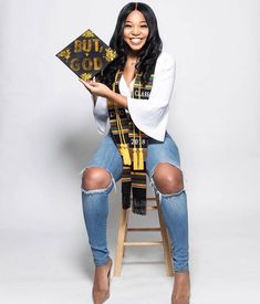 a woman sitting on top of a wooden chair holding a sign that says instagram