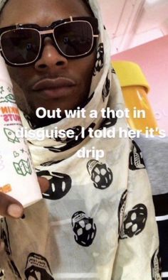 a man wearing sunglasses and a scarf holding up a tube of toothpaste with the caption out witt a thot in english