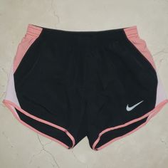 This Is A Brand New Pair Of Shorts By Nike Dri Fit. Beautiful Black And Light Pink Color Combination. Inner Drawstring Waistband For The Perfect Fit. These Will Become Your Go-To Shorts For Everyday. Made Of A Lightweight, Moisture-Wicking Fabric. So Comfortable, Classic, And Easy To Wear. "Underwear" Lining For Full Support And Coverage. Brand New In Perfect Condition. Purchased For $35+Tax. Buy It Here For A Fraction Of The Price I Paid. Please Let Me Know If You Have Any Questions! I Am Selli Casual Pink Athletic Shorts For Training, Pink Athletic Shorts For Gym With Elastic Waistband, Pink Sports Shorts With Elastic Waistband, Pink Athletic Shorts With Elastic Waistband For Gym, Pink Athletic Shorts With Elastic Waistband For Training, Pink Athletic Shorts With Elastic Waistband For Sports, Pink Elastic Waistband Shorts For Sports, Sporty Pink Moisture-wicking Athletic Shorts, Pink Sportswear Athletic Shorts For Gym