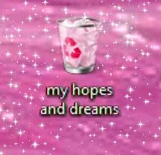 a glass filled with ice sitting on top of a pink floor covered in stars and sparkles