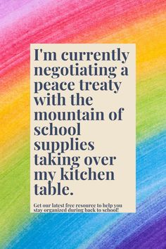 a rainbow colored background with the words i'm currently negotiating a peace treat with the mountain of school supplies taking over my kitchen table