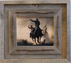 a painting of a cowboy riding a horse with two other cowboys in the back ground