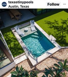 an aerial view of a small pool in the middle of a yard with grass and trees