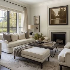 a living room filled with furniture and a fire place