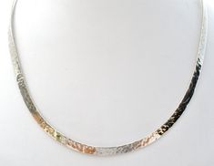 Vintage Jewelry - This is a sterling silver hard collar necklace with a hammered design. It measures almost .25" wide, inside circumference is 14", opening is 1.38", hallmarked Mexico 925, signed DDD for Dominique Dinouart . The necklace is slightly flexible and is curved to lay nicely, Silver Hammered Necklace For Anniversary, Hammered White Gold Necklaces For Anniversary, White Gold Hammered Necklace For Anniversary, Modern Silver Hammered Necklace, Hammered Silver, Collar Necklace, Diamond Necklace, Vintage Jewelry, Chain Necklace